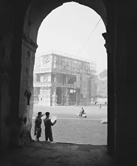 Building Construction Prints: Tourists near Arch of Constantine Covered in Scaffolding