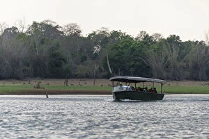 Images Dated 10th April 2012: Tourists in safari boat on Kabini Reservoir, Nagarhole National Park, Karnataka, India