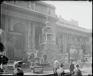 Library Prints: Tower of Books Piled Outside of Library