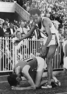 Melbourne Prints: Track Star Standing over Opponent at Finish Line