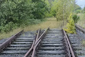 The End Prints: Tracks running into the countryside at a disused railway station on a regional route from Marburg - Erdtebrueck