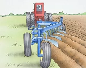 Tractor pulling a plough