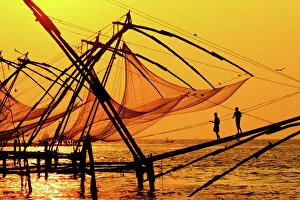 Images Dated 19th March 2015: Traditional chinese fishing nets in Kochi, India at sunrise