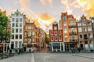 Netherlands Collection: Traditional Dutch old houses in Amsterdam at sunset, Netherlands