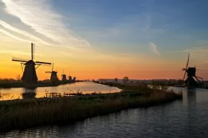 Images Dated 21st April 2015: Traditional windmills at sunrise, Kinderdijk