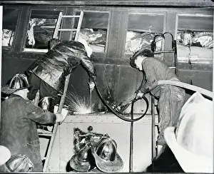 Crash Prints: Train Wreck; Police Cut Away At Train