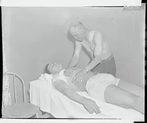 Jack Blackburn Prints: Trainer Massaging Joe Louis