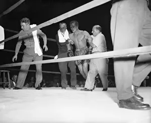 Trainers Helping Tony Zale to His Corner