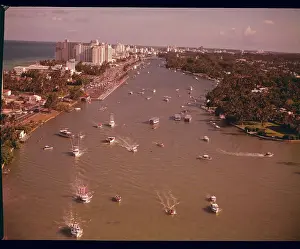 Travelers by Boats near Miami Hotel Site