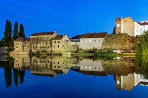 Images Dated 25th June 2016: Trebinje reflected in the TrebiA┬ínjica river at night, Bosnia and Herzegovina