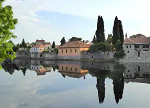 Reflection Lake Prints: Trebinje reflected in the TrebiAanjica river, Bosnia and Herzegovina