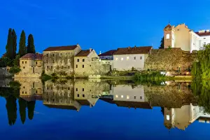 Reflection Lake Prints: Trebinje reflected in the TrebiAanjica river at night, Bosnia and Herzegovina