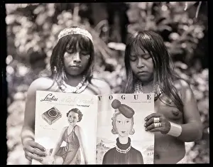 Tribal Women Reading Magazine
