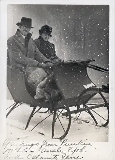 Prints of Winter scene with Ephraim Burt and Alice Kent Trimpey seated in a sleigh wearing overcoats and hats, and covered with a fur lap robe, Baraboo, Wisconsin, 1920 Celebrate the Season: A Curated Collection of Christmas Art: Trimpey Christmas Card
