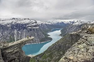 Trolltunga, Trolls Tongue, Ringedalsvatn reservoir below, Folgefonn Glacier at the back, near Odda, Hordaland province