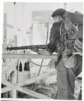 Nicosia Prints: Trooper Walking With Weapon Drawn
