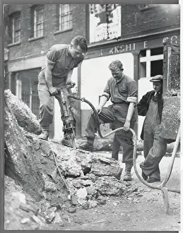 Difficult Prints: Troops Breaking Concrete with Pneumatic Drill