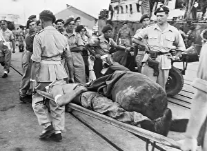 Haifa Prints: Troops Carrying Man on Stretcher