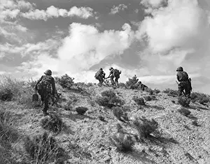 Crawling Prints: Troops Crossing Pohang Battle Front, Korea 1950