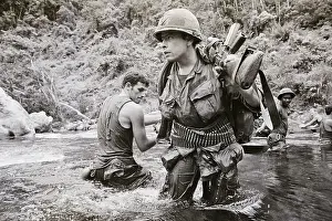 US Troops Ford A Vietnamese River