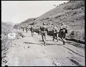 Troops Marching Up Road