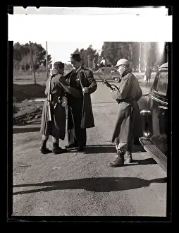 Searching Prints: Troops Search Press Correspondent