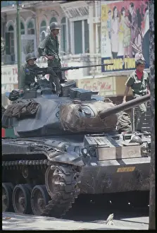 Troops and Tanks Clearing the Streets