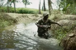 Troops Wading Through Water
