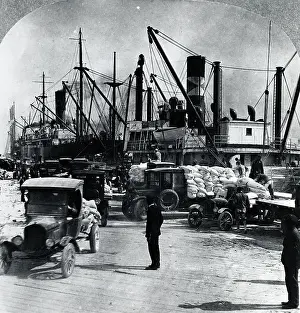 Wharf Prints: Trucks at Wharf Carry Bags from Ships