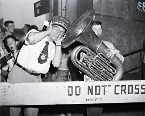 Saxophone Prints: Tuba Player With Gate Keeper At Stadium
