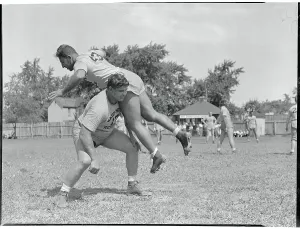 Arlington Prints: Turk Edwards Blocking Eddie Kahn