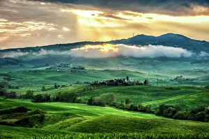 Prints of The sun busrting through the clouds after a rainstorm in the Tuscany region of Italy. Tuscany is famous for it's gorgeous landscapes and considered to be the birthplace of the Renaissance Travel Imagery Prints: Tuscan Sunburst