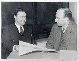 Commissioner Prints: TVA Officials Reading Newspaper