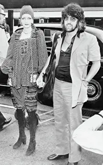 Twiggy and her Manager Justin de Villeneuve At Heathrow Airport