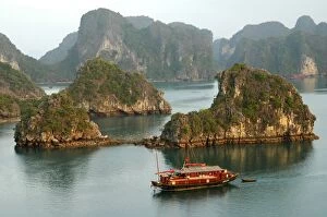 Vietnamese Culture Gallery: Twilight over the island world of the UNESCO-declared world natural heritage Halong Bay Viet Nam