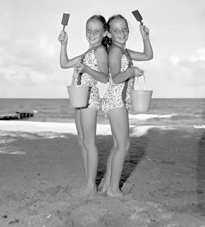 Pre Teen Girl Prints: Twin Sisters (10-12) Posing With Their Sand Buckets and Shovels
