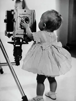Austin Prints: Two-Year-Old Girl Inspects Camera Lens