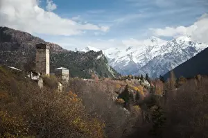 Georgia Country Prints: Typical Svanetian Tower and the High Caucasus mountains in Mestia, Svaneti, Georgia