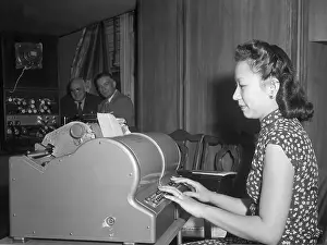 Typing Prints: Typist Sits At First Chinese Typewriter