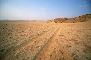 Namibia Collection: Tyre Tracks Through the Desert