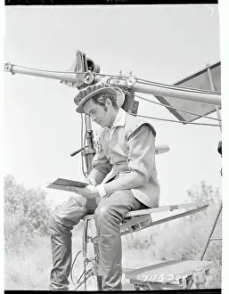 Tyrone Power Reading a Best Seller