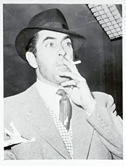 Tyrone Power Smoking a Cigarette