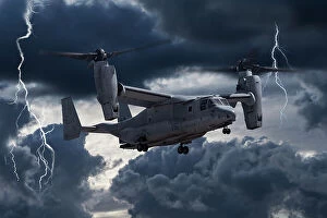 Airplanes Collection: U. S. Marine Corps Bell/Boeing U. S. Marine MV-22 Osprey tilt-rotor aircraft with lightning