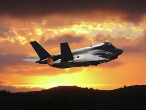 Airplane Prints: A U. S. Marine Corps Lockheed Martin F-35B Lightning II stealth fighter takeoff during sunset
