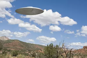 Images Dated 11th May 2012: UFO flying over desert