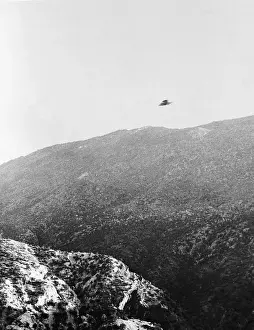 Riverside Prints: UFO over Mountain Above Skyline