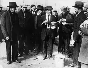 Relief Prints: Unemployed Men Receive Soup and Bread