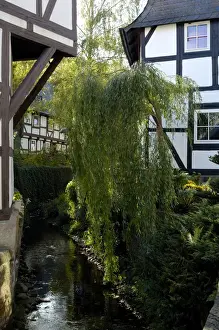 Idyll Prints: UNESCCO World Heritage Site picturesque old town framework houses at brook Goslar Lower Saxony Germany