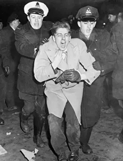 Rioter Prints: Unidentified Rioter Taken into Custody