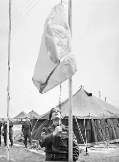 Nicosia Prints: United Nations Soldier Raising Flag at Camp